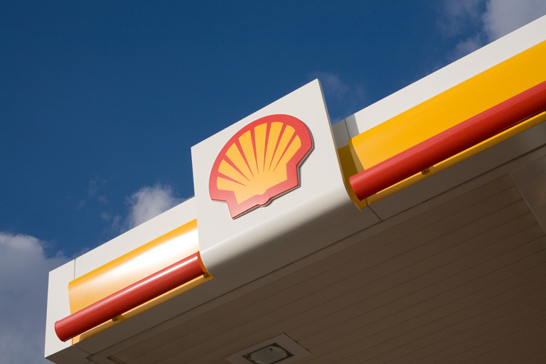 Royal Dutch Shell sign outside forecourt of service station. Image credit: Shell International