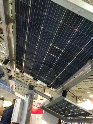 Big Sun’s iPVTracker complete with bifacial modules, shown on the Big Sun booth at the 2018 Energy Taiwan event in Taipei on 19 September 2018, as pictured from below. Mounting height, tracking design and how to use the area underneath the mounted bifacial modules are set to be the key factors for bankability of bifacial modules in 2019. Image: PV Tech