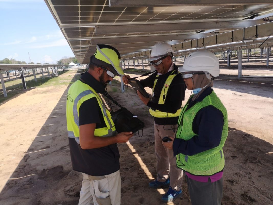 Greencells employees trialling AR technology at a recent site build. Image: Greencells. 
