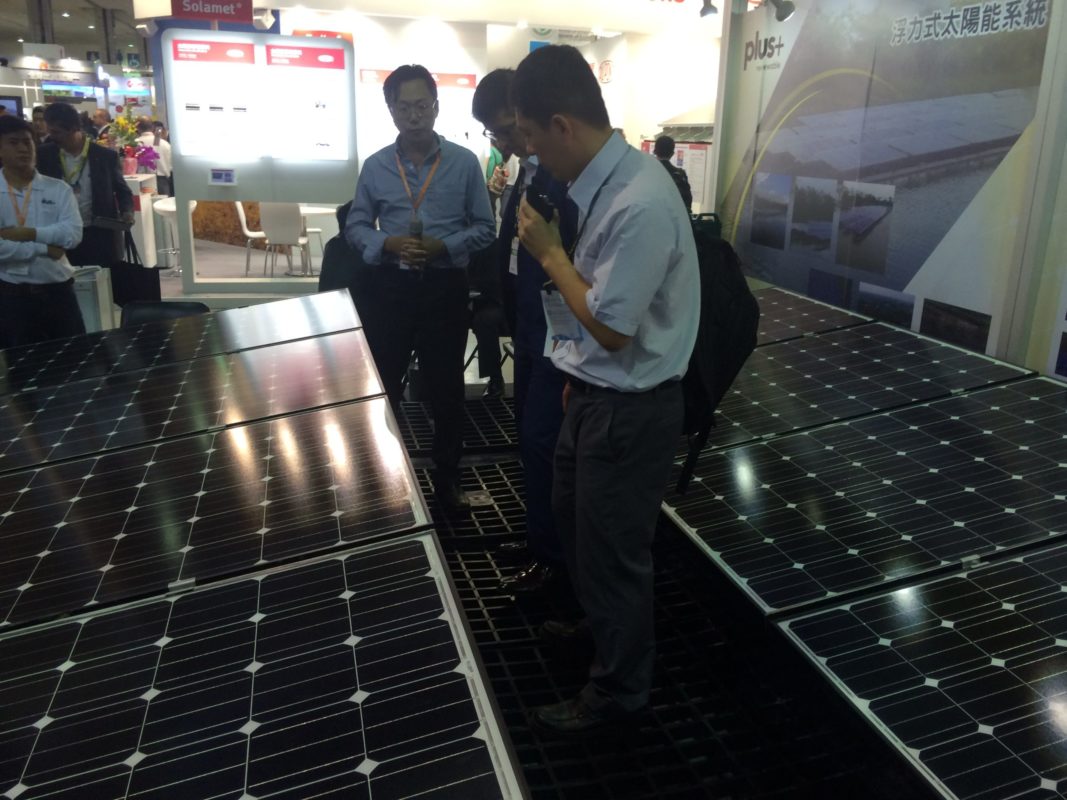 Charles Huang of Plus Renewable explains the potential for floating solar in Taiwan at teh PV Taiwan exhibition in Taipei. Credit: Tom Kenning