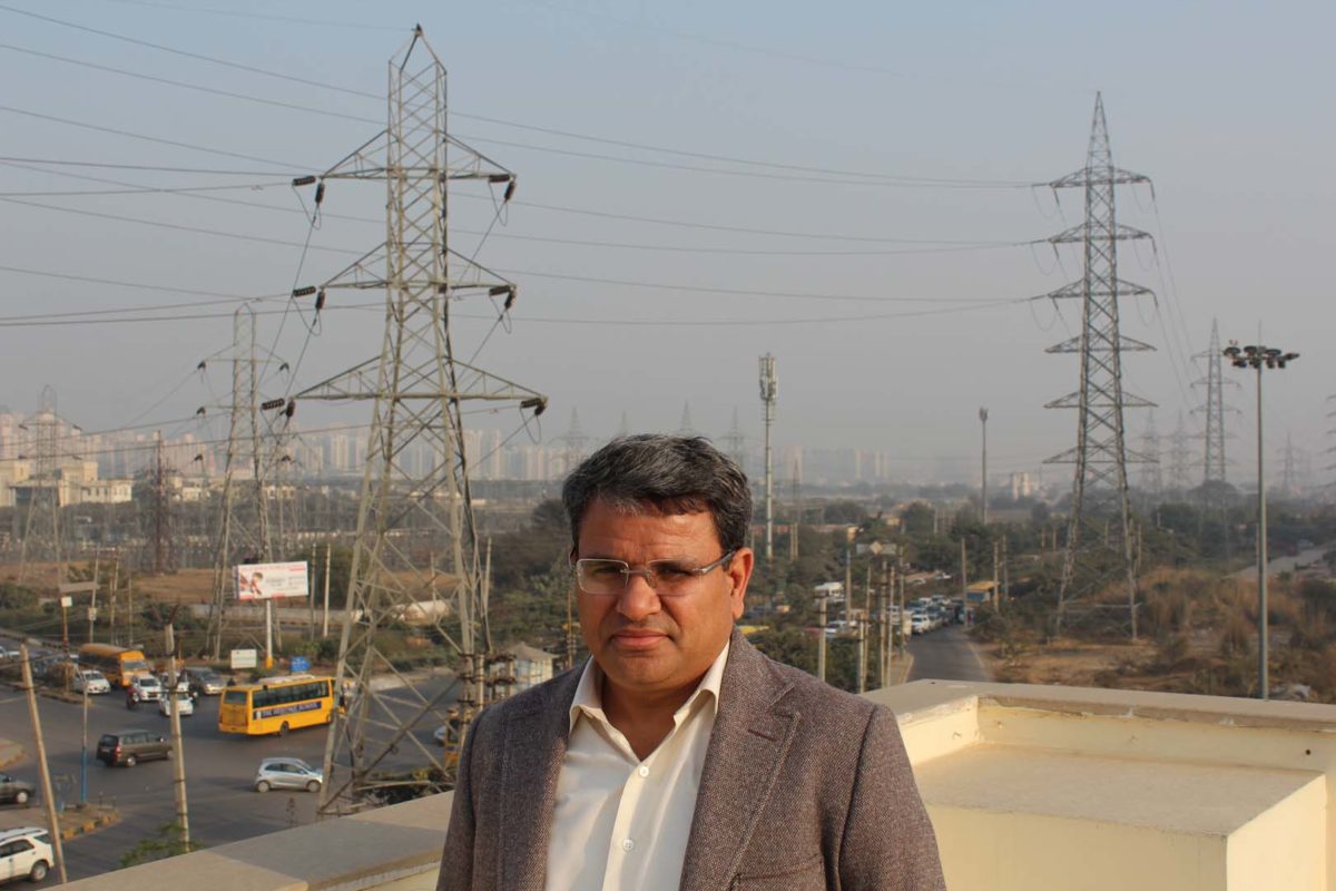 Manoj Kumar Upadhyay, the founder, chairman and managing director of ACME group, at the company offices in Gurgaon, New Delhi. Credit: Tom Kenning.