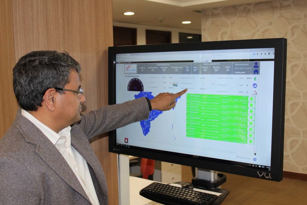 Upadhyay looks at analytics of a solar plant. Credit: Tom Kenning