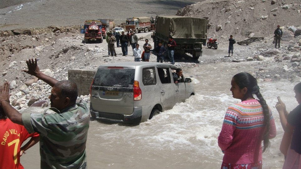 Hold up at a glacier melt on the Manali-Leh highway. Credit: Tom Kenning