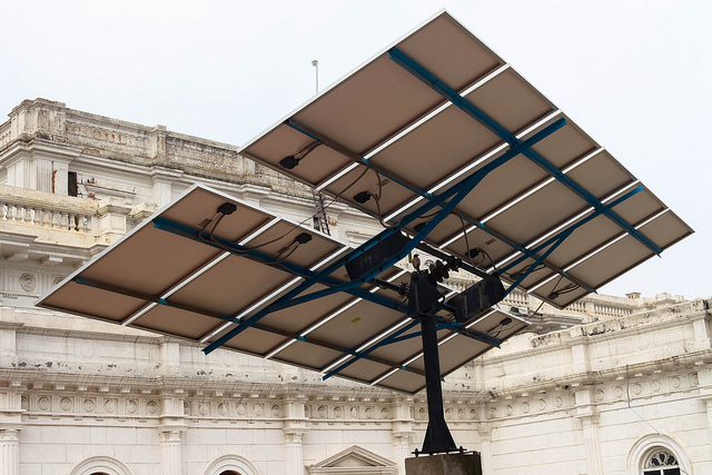 Solar modules with trackers in Lahore, Pakistan. Flickr: Paul Keller