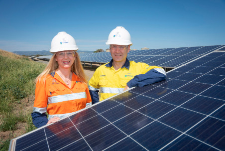 SA Water's procurement manager Nichola Murphy and chief exec Roch Cheroux inspect solar PV panels at a site in Glenelg, South Australia. Image: SA Water.