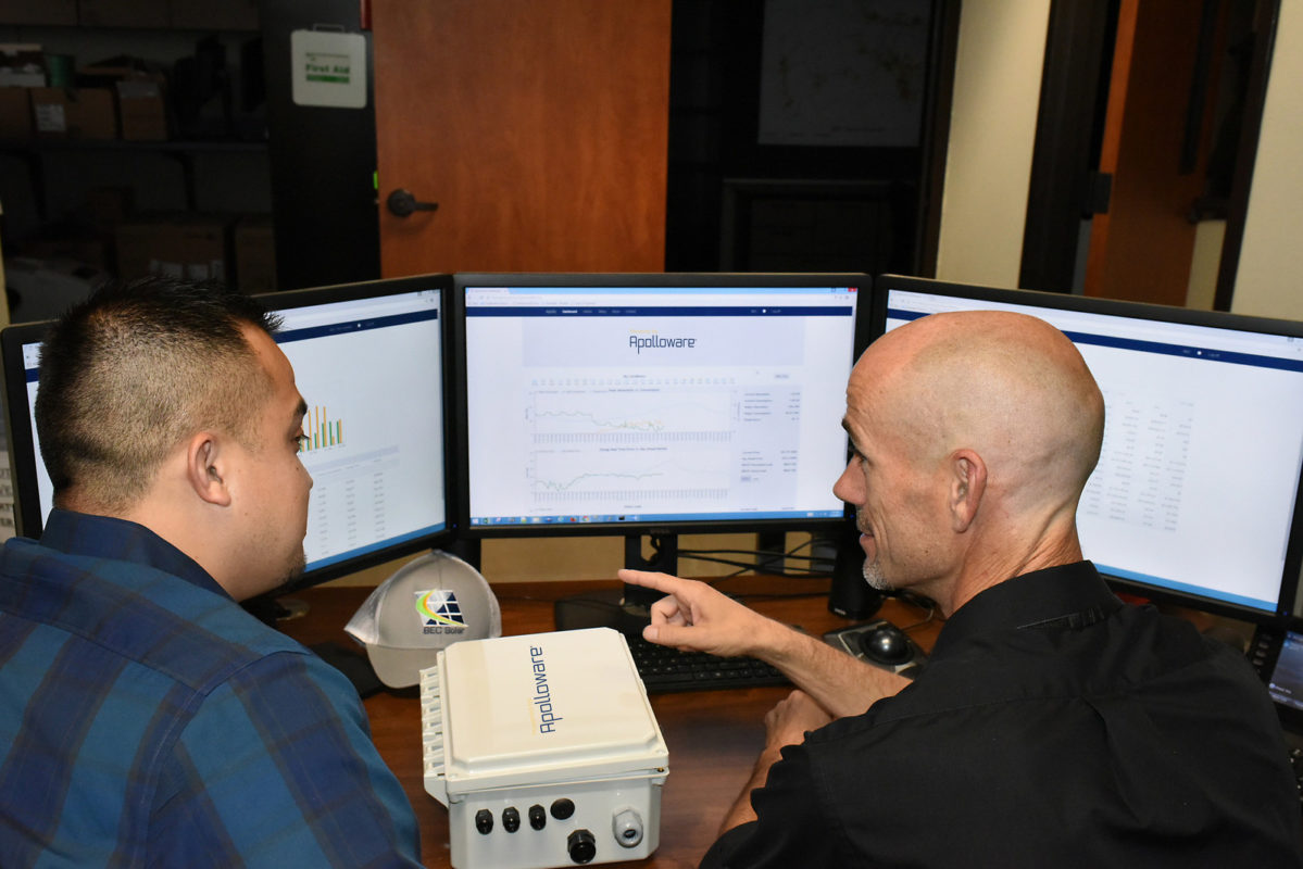 BEC Renewable Energy programme manager Miguel Rivera and database administrator Perry Holt test Apolloware. Source: PR Newswire