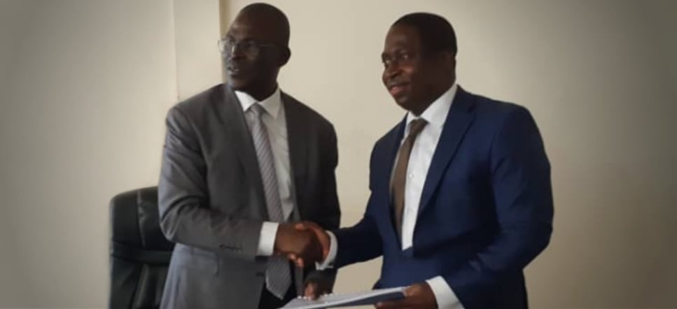 Infraco Africa's Head of West Africa Business Development, Kodjo Afidegnon, signs a PPA for the company's Djermaya Solar project in Chad with Michel Boukar, Minister of Petroleum and Energy. Credit: InfraCo Africa Twitter