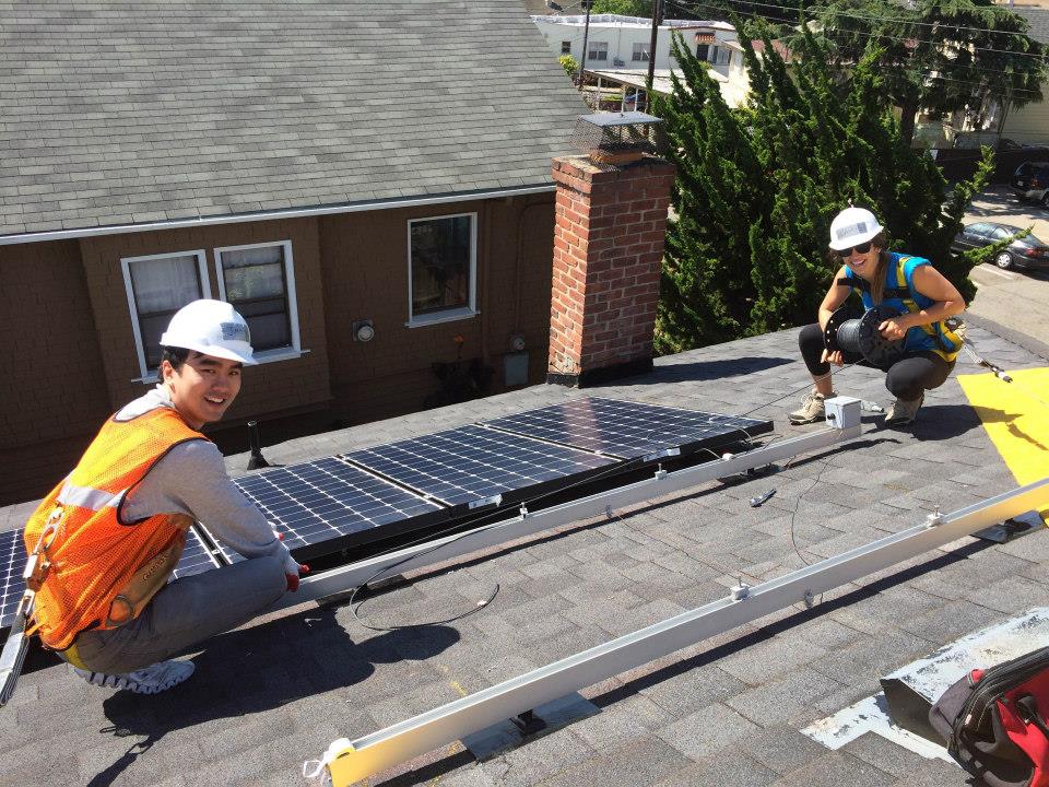 Sunrun installers on a customer's roof. Image: Sunrun.