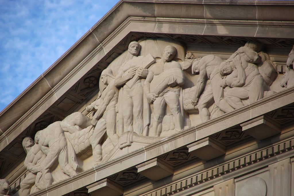 'Toil' as presented on the pediment of the US Commerce Department. Source: Flickr/Tim Evanson.