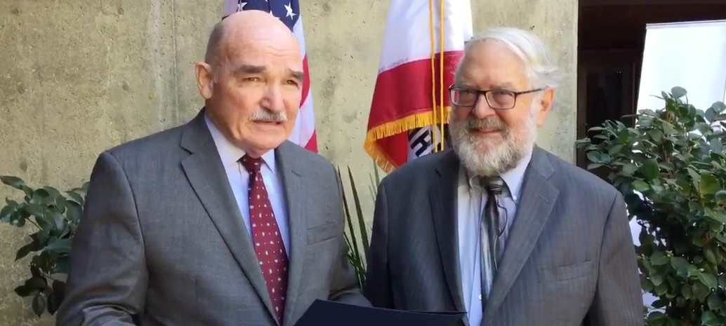 Assistant Secretary of the Navy Dennis McGinn and CEC Chair Robert Weisenmiller. The US Navy and California Energy Council recently announced a new partnership on renewable energy projects just before the dedication of the 210MW Mesquite project. Source: California Energy Commission