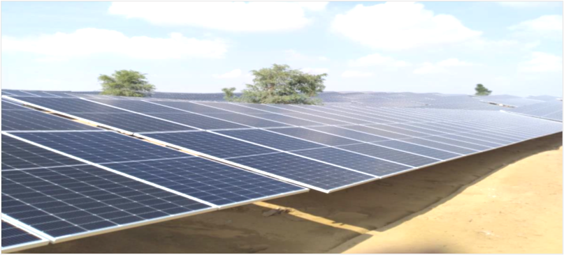 Solar panels deployed on sandy ground in the Indian state of Rajasthan