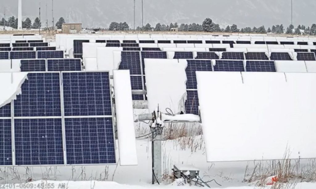 Solar panels covered by snow.