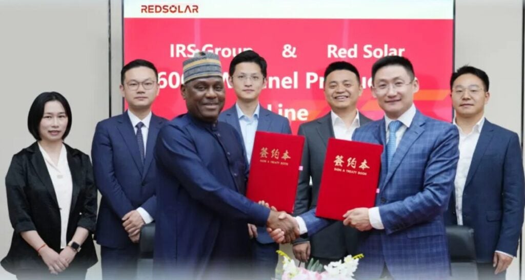 The signing agreement for Redsolar's Nigerian investment.