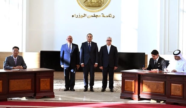 Egyptian prime minister Mostafa Madbouly (centre) during the signing ceremony.