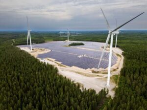 Hybrid solar-wind park, surrounded by trees, from European Energy in Sweden