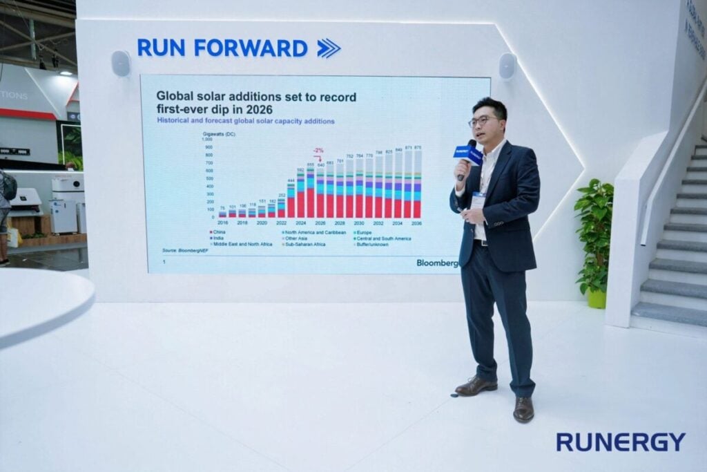 BNEF's Youru Tan makes a speech at Runery's booth at Intersolar Europe 2026.