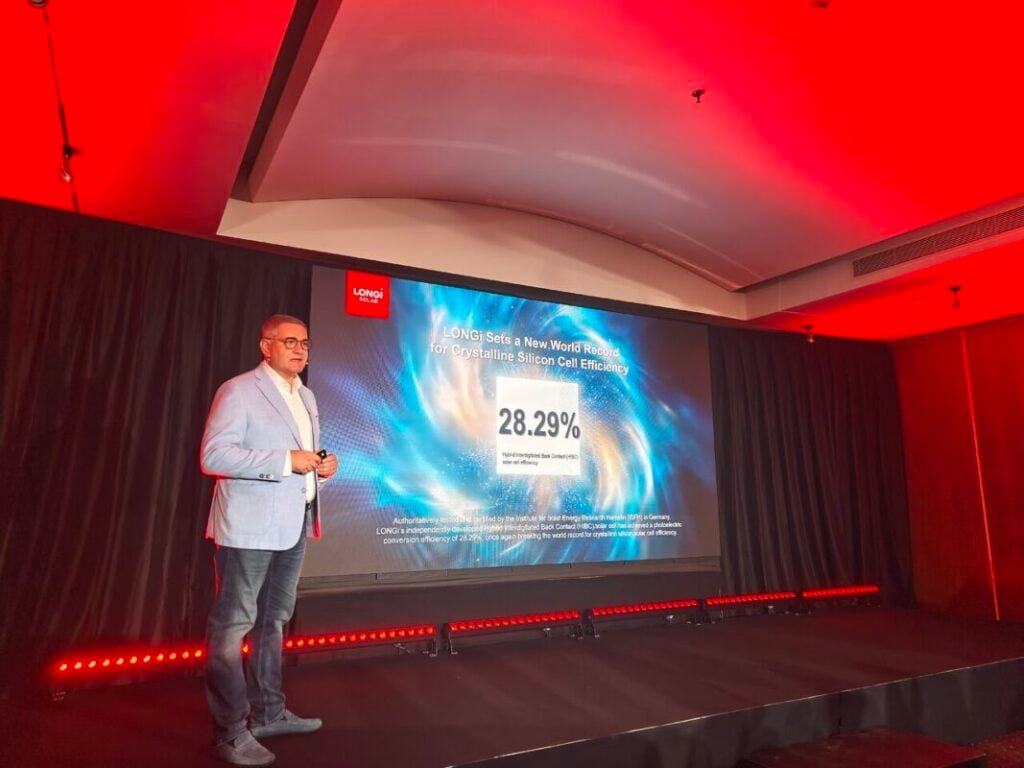 LONGi Distributed Generation general manager of eastern Europe Adrian Kočan speaks at an industry event.