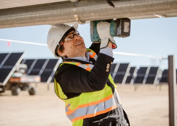ContourGlobal's CEO installing the last solar panel at the Black Hollow Sun solar project in Colorado.