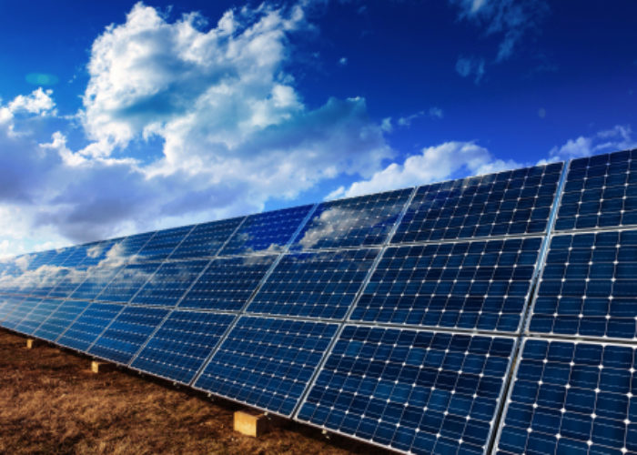 500px Photo ID: 126083711 - Solar panels installation for renewable energy and blue cloudy sky