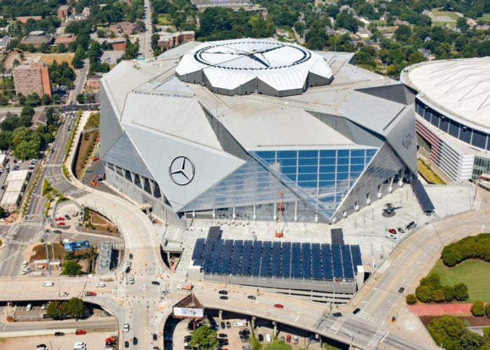 Georgia Power foreground solar panels Mercedes Benz Stadium