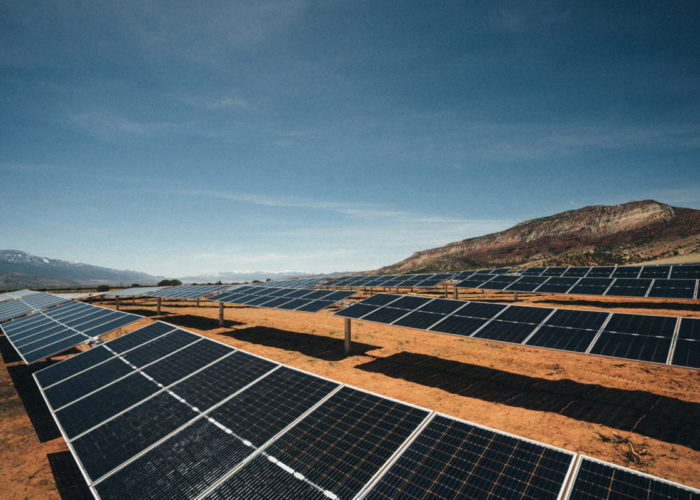 Nevados All Terrain trackers installed on rolling terrain in a utility-scale solar project in Utah.