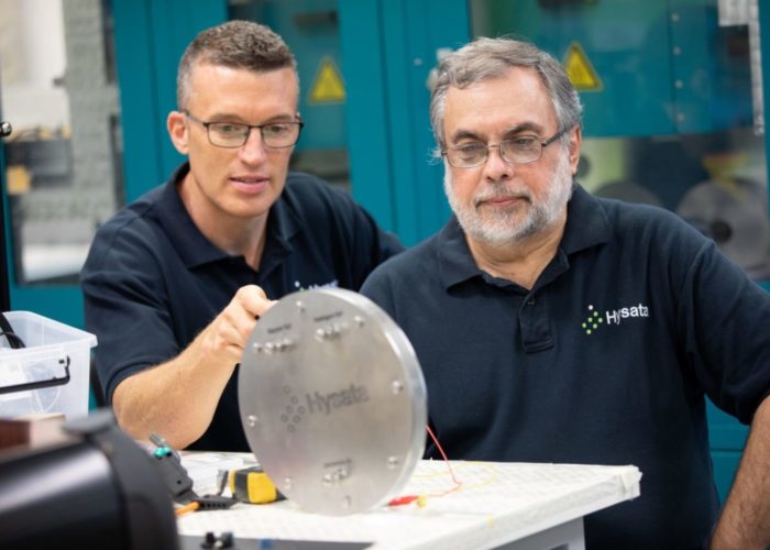 Paul Barret, CEO of Hysata, and Gerry Swiegers, CTO looking at their 95% system efficient electrolyser. Image: Hysata.