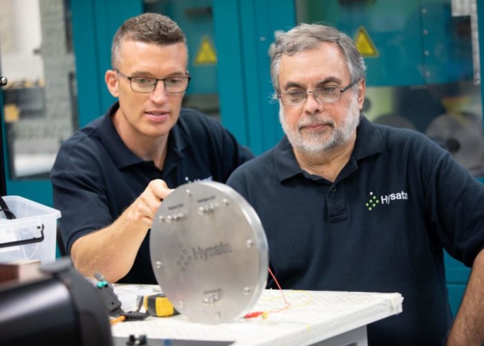 Paul Barret, CEO of Hysata, and Gerry Swiegers, CTO looking at their 95% system efficient electrolyser. Image: Hysata.