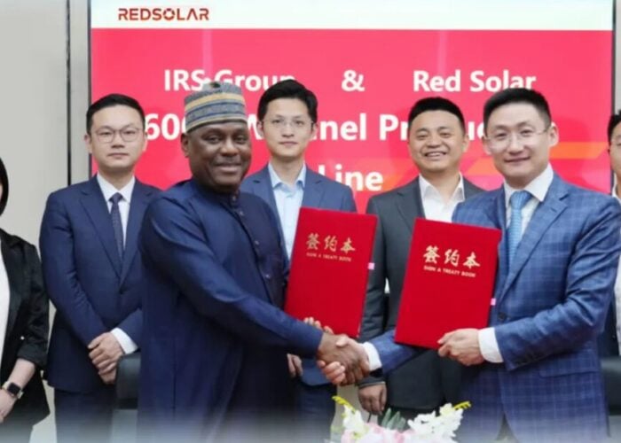 The signing agreement for Redsolar's Nigerian investment.