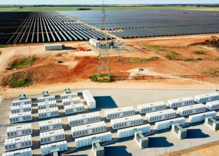 Large-scale solar PV plant in Victoria, Australia, with battery storage in foreground. The new CfD is designed to stimulate investment in large-scale PV and wind, which has stalled in Australia in recent months. Image: Edify Energy.