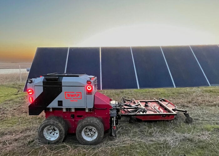 Automated machine from Swap Robotics working on a solar PV field