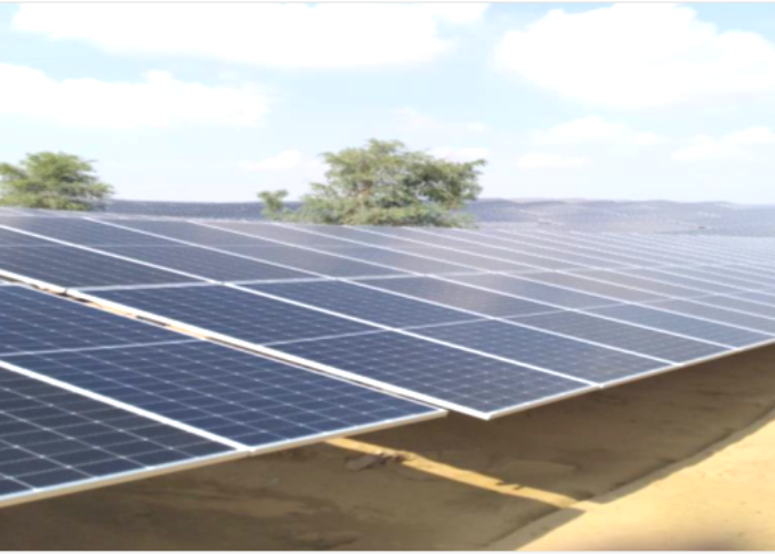 Solar panels deployed on sandy ground in the Indian state of Rajasthan