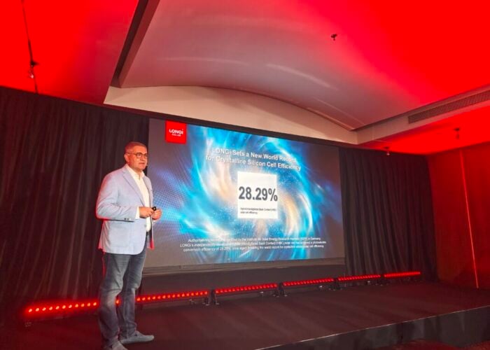 LONGi Distributed Generation general manager of eastern Europe Adrian Kočan speaks at an industry event.