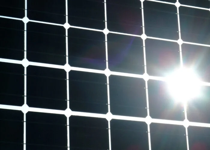 The GLA building's solar panels" by James Cridland is licensed under CC BY 2.0.
