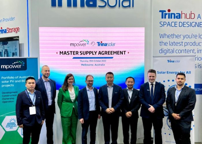MPower and Trina Solar executives at the Trina Solar stand at All-Energy Australia following the signing. Image: Trina Solar